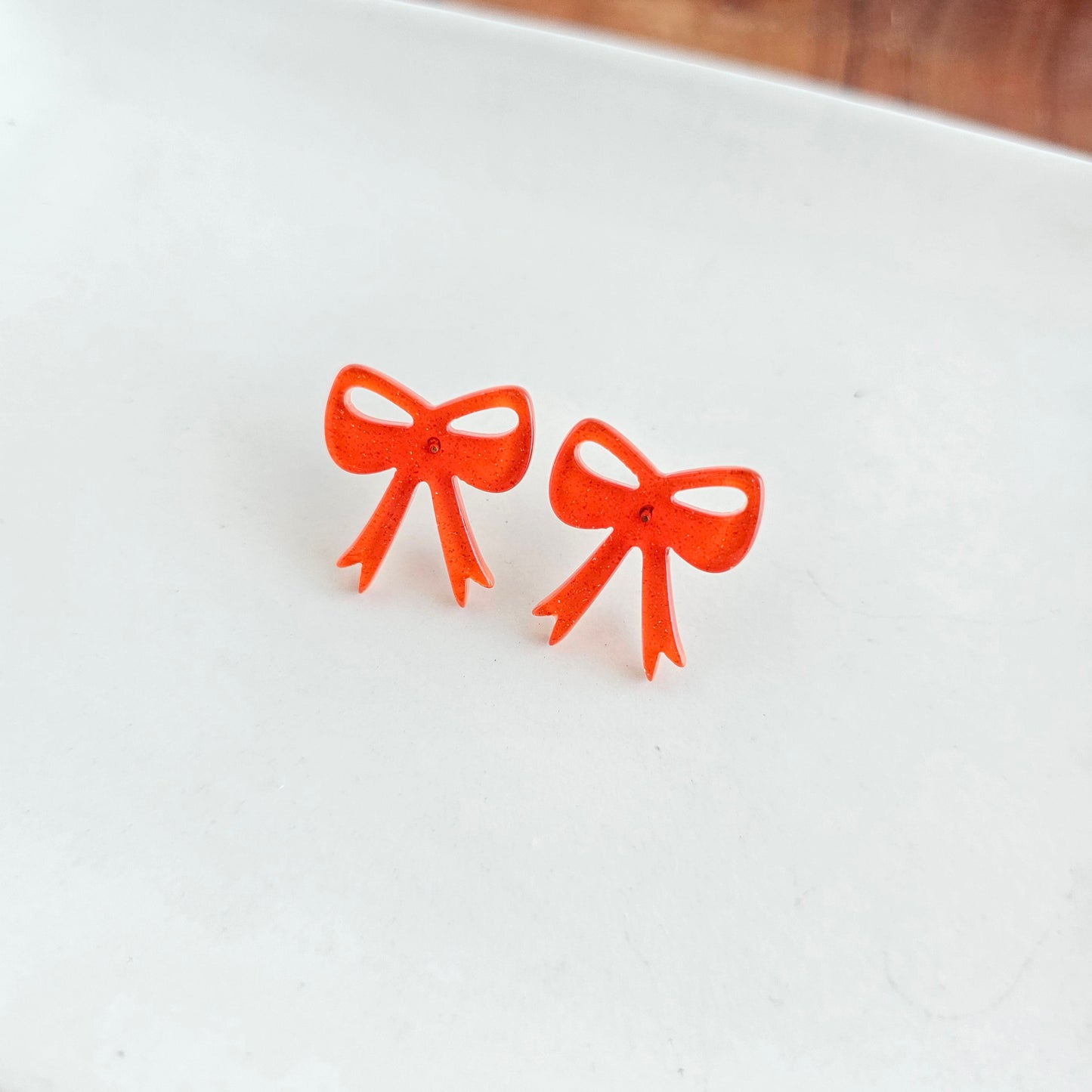 Bow Studs - Orange Glitter