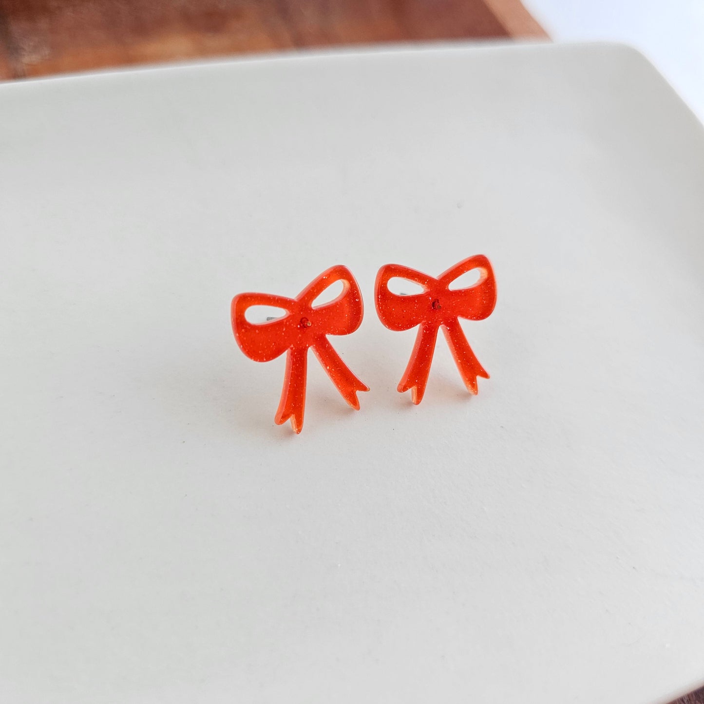 Bow Studs - Orange Glitter